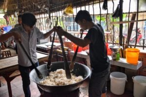 Vietnam and Cambodia making rice candies on the Riches of the Mekong