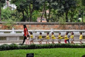 School children visiting Temple of Literature in Hanoi