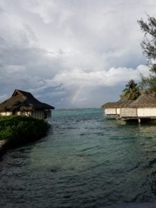 A view of several over water bungalows